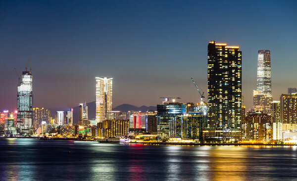 Hong Kong city with illuminated modern skyscrapers at night