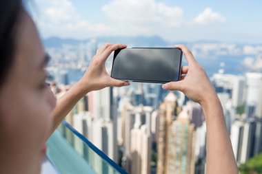 Hong Kong şehrinin kadın alarak fotoğraf