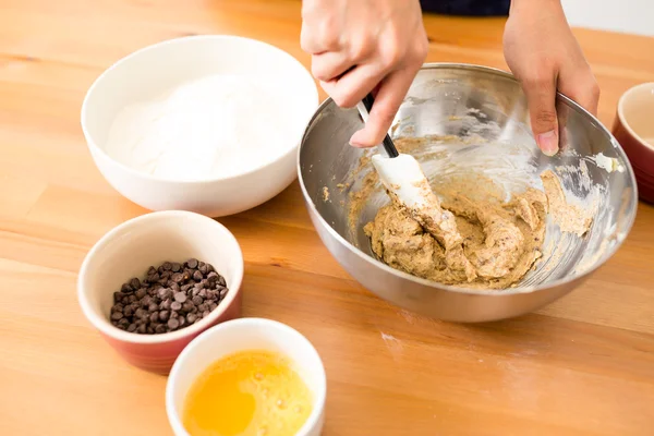 Woman mixing the dough — Stock Photo, Image