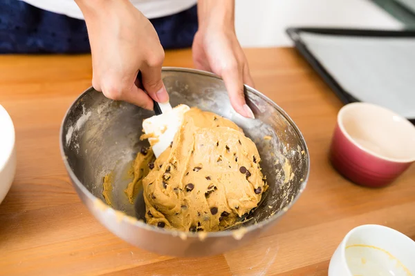 Stirring the dough for making cookies — Stock Photo, Image
