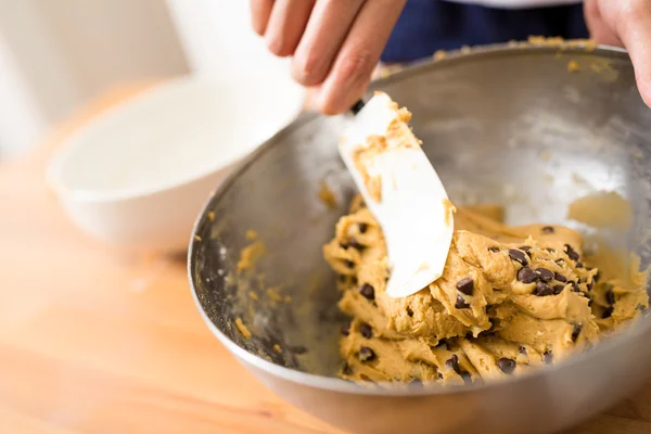 Woman mixing the dough — Stock Photo, Image