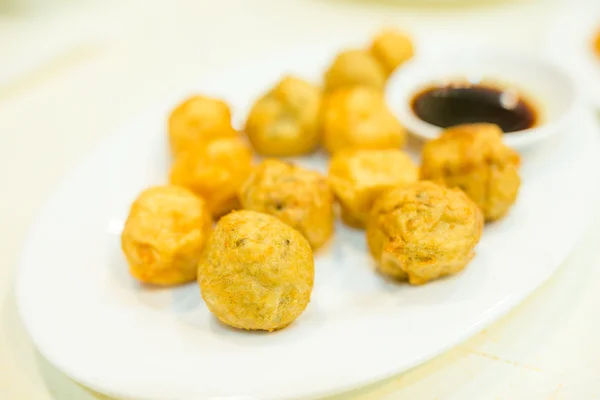 Squid balls on plate — Stock Photo, Image