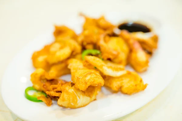 Fried squid on dish — Stock Photo, Image