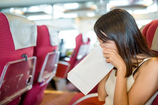 Woman suffering form seasick and vomit — Stock Photo, Image