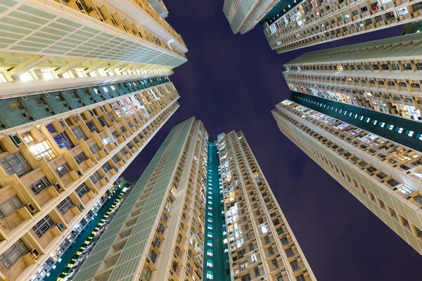 Apartment buildings to the sky at night