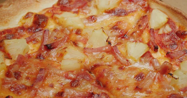 Delicious fresh pineapple pizza close up