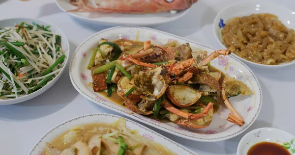 Steamed fish and lobster with roasted pork in chinese family homemade dinner