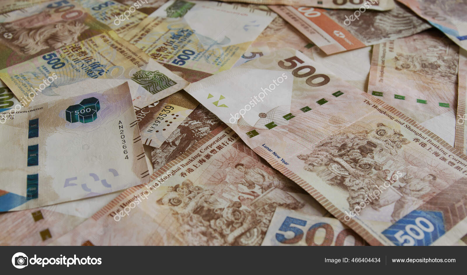 一堆堆港元钞票500元——图库图片© leungchopan #466404434