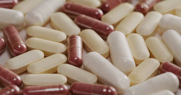 Stack of medicine on table