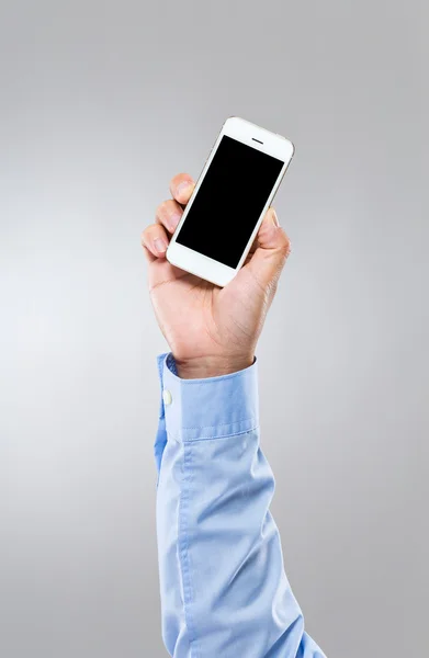Businessman hold up mobile phone with blank screen — Stock Photo, Image