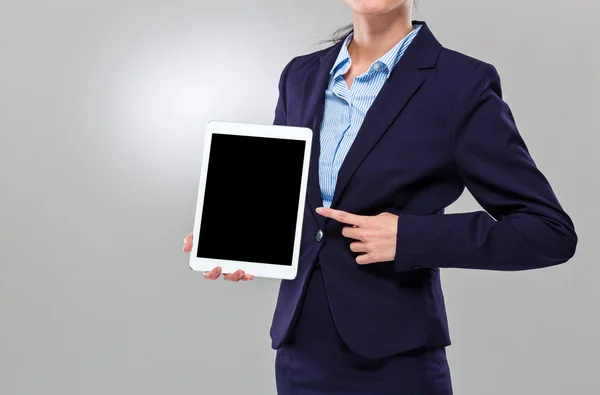 Businesswoman finger point to blank screen of digital tablet Stock Picture
