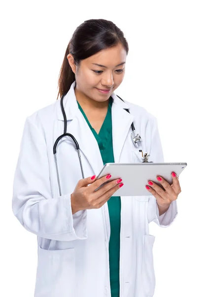 Female medical doctor look at the digital tablet — Stock Photo, Image