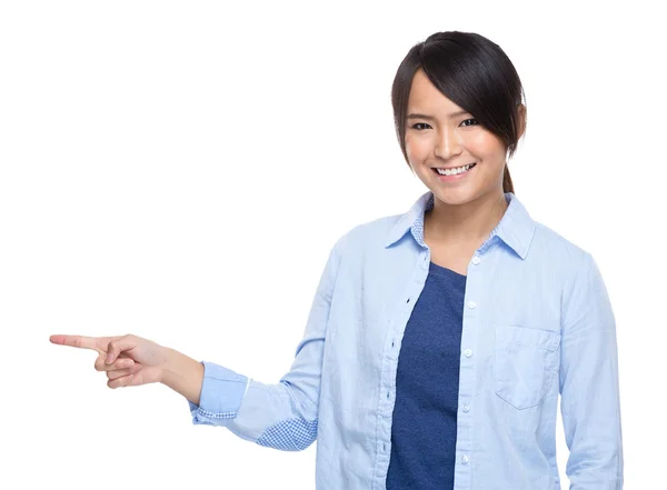 Woman with finger point aside — Stock Photo, Image