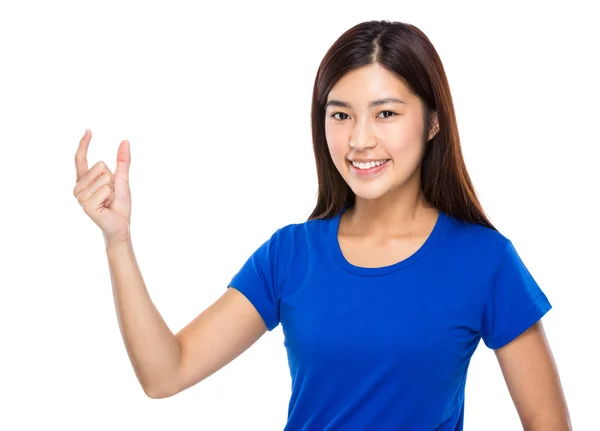 Asian woman with small thing hold on finger — Stock Photo, Image