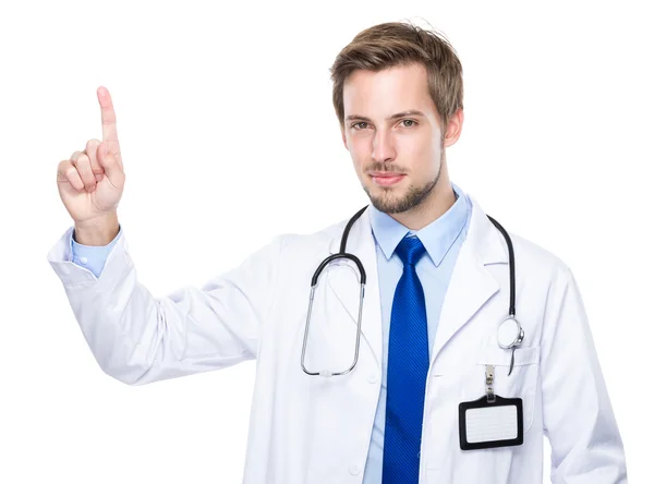 Médico caucásico con el dedo en alto —  Fotos de Stock