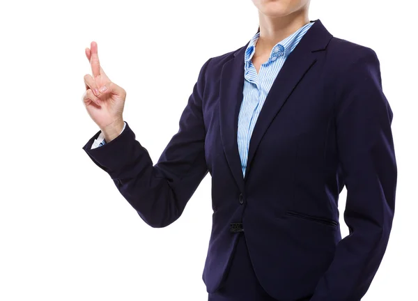 Businesswoman with finger crossed — Stock Photo, Image