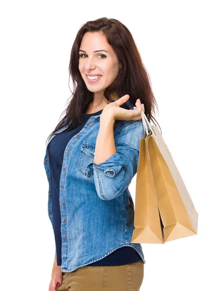 Brune femme tenir avec sac à provisions — Photo