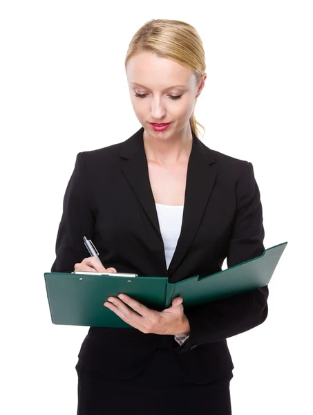 Businesswoman write on clipboard — Stock Photo, Image