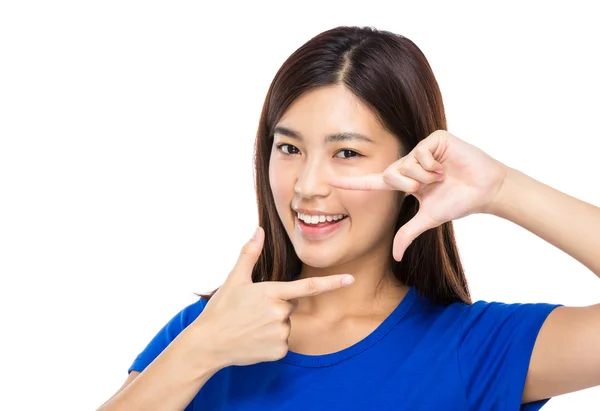 Woman showing with finger frame — Stock Photo, Image