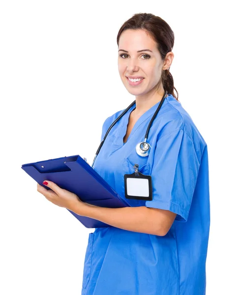 Female doctor with clipboard — Stock Photo, Image