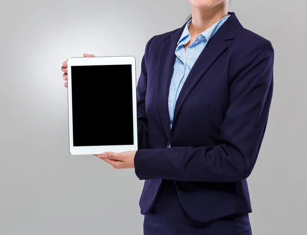 Businesswoman with blank screen tablet Stock Picture