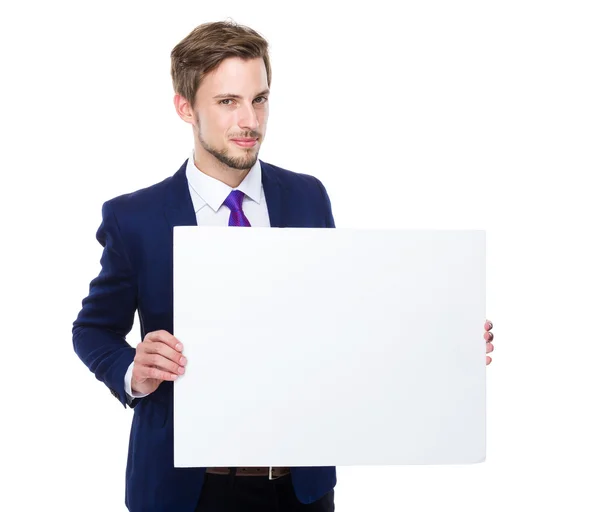 Businessman with placard — Stock Photo, Image