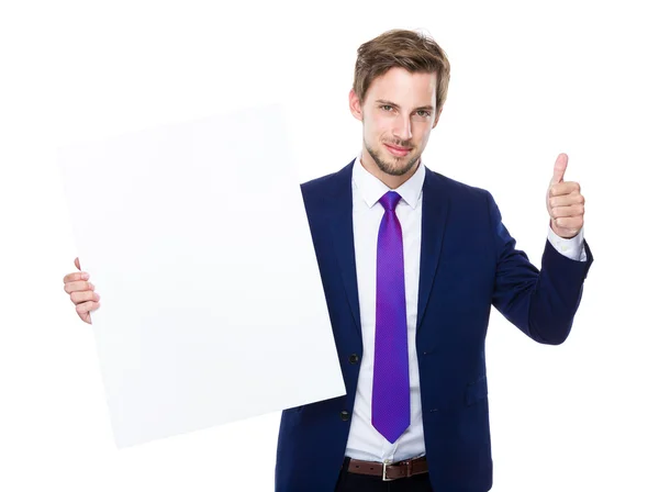 Empresário com cartaz e polegar para cima — Fotografia de Stock