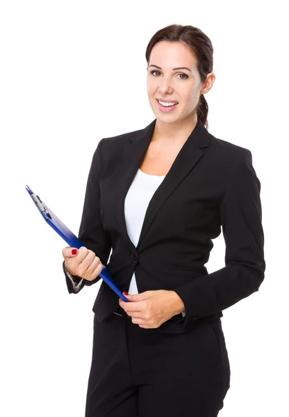 Brunette businesswoman with clipboard — Stock Photo, Image