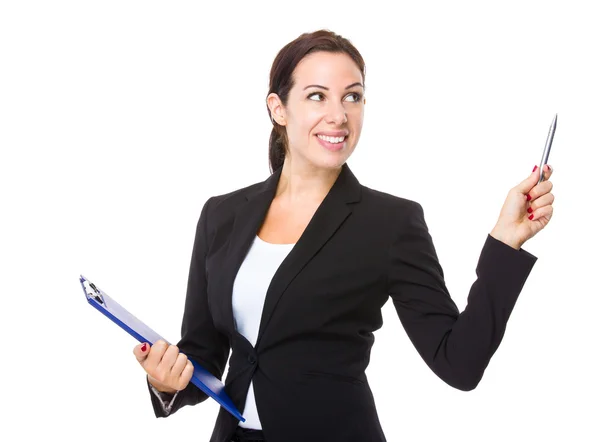 Businesswoman with clipboard and pen — Stock Photo, Image