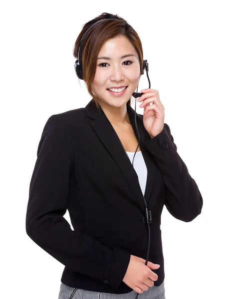 Mujer de negocios con auriculares — Foto de Stock