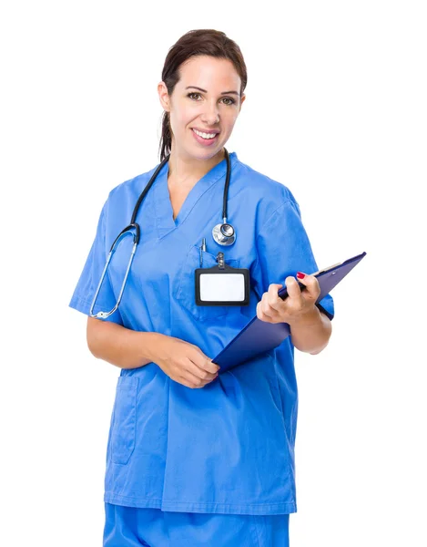 Female doctor with clipboard — Stock Photo, Image