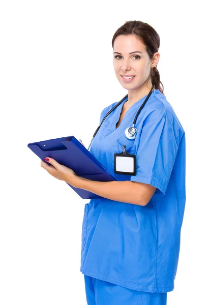 Female doctor write on clipboard — Stock Photo, Image