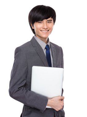 Dizüstü bilgisayarı olan iş adamı