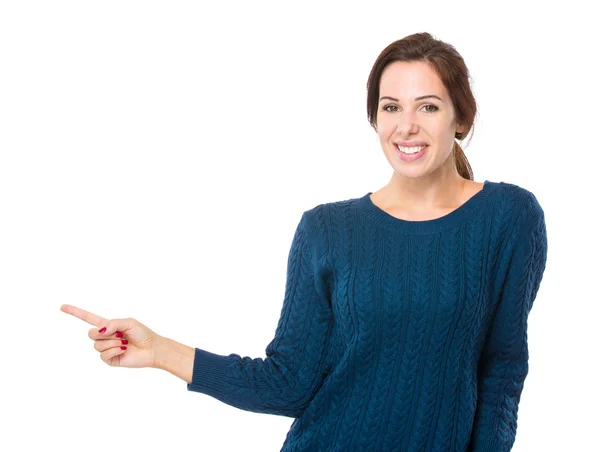 Woman with finger point aside — Stock Photo, Image
