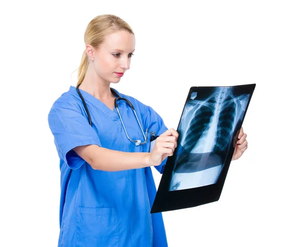 Doctor looking at x ray film — Stock Photo, Image