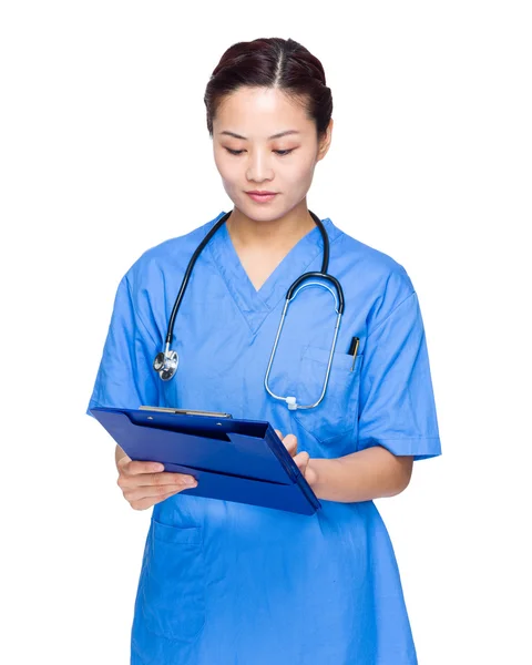 Female doctor write on clipboard — Stock Photo, Image