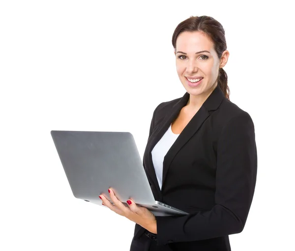 Businesswoman using laptop — Stock Photo, Image