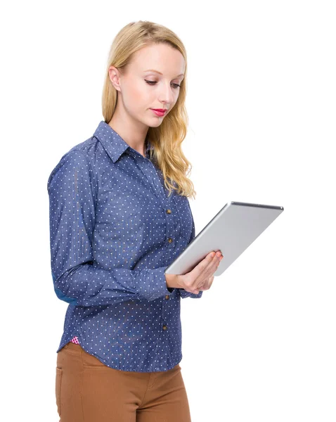 Woman looking at digital tablet — Stock Photo, Image