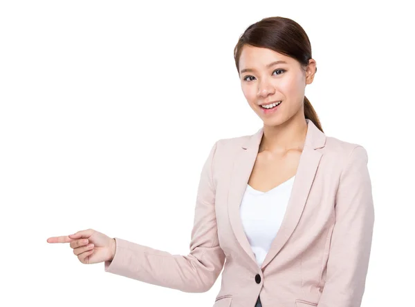 Businesswoman with finger point aside — Stock Photo, Image