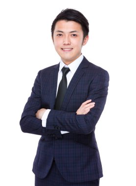 Kolları çapraz iş adamı