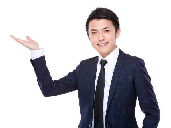 Businessman with hand present — Stock Photo, Image