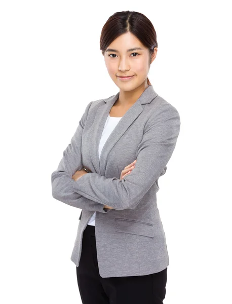 Young businesswoman with arms crossed — Stock Photo, Image