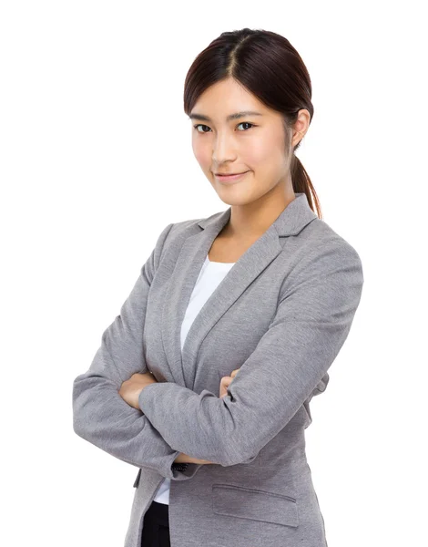 Young businesswoman with arms crossed — Stock Photo, Image