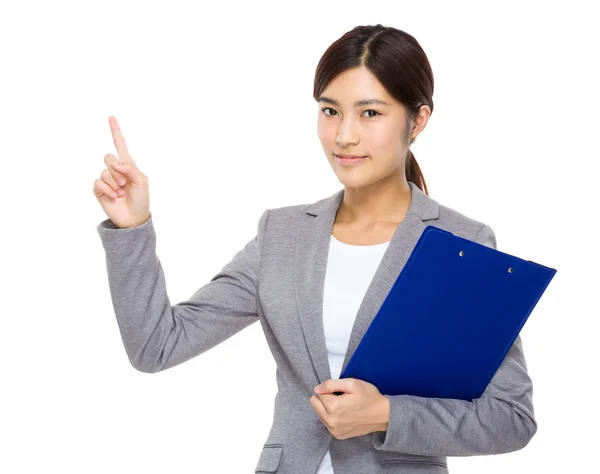 Businesswoman with clipboard and finger up — Stock Photo, Image