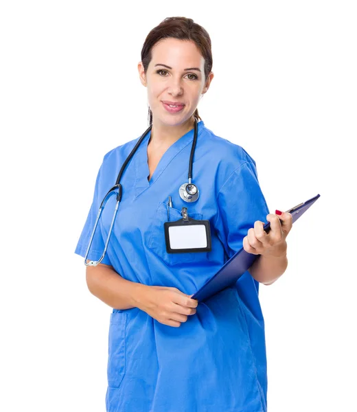 Female doctor with clipboard — Stock Photo, Image