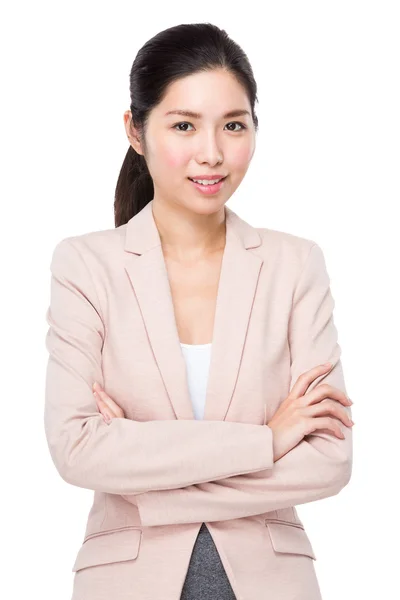 Beautiful businesswoman with arms crossed — Stock Photo, Image