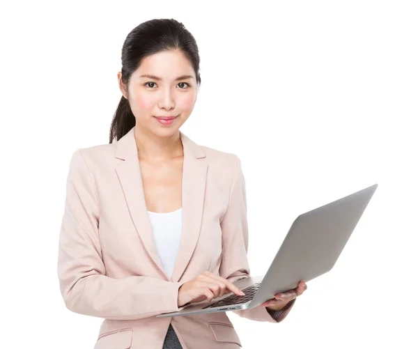 Businesswoman using laptop — Stock Photo, Image