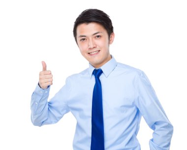 Baş parmağı havada bir iş adamı.