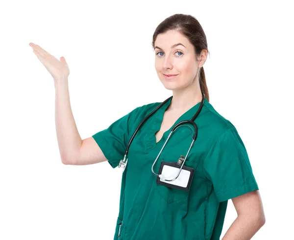 Female doctor with hand present — Stock Photo, Image