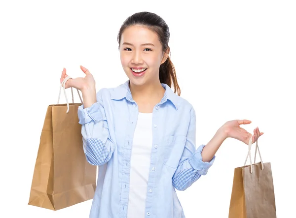 Mulher segurando sacos de compras — Fotografia de Stock